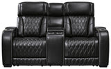 Side angle of Boyington Black Leather Power Reclining Loveseat showing console