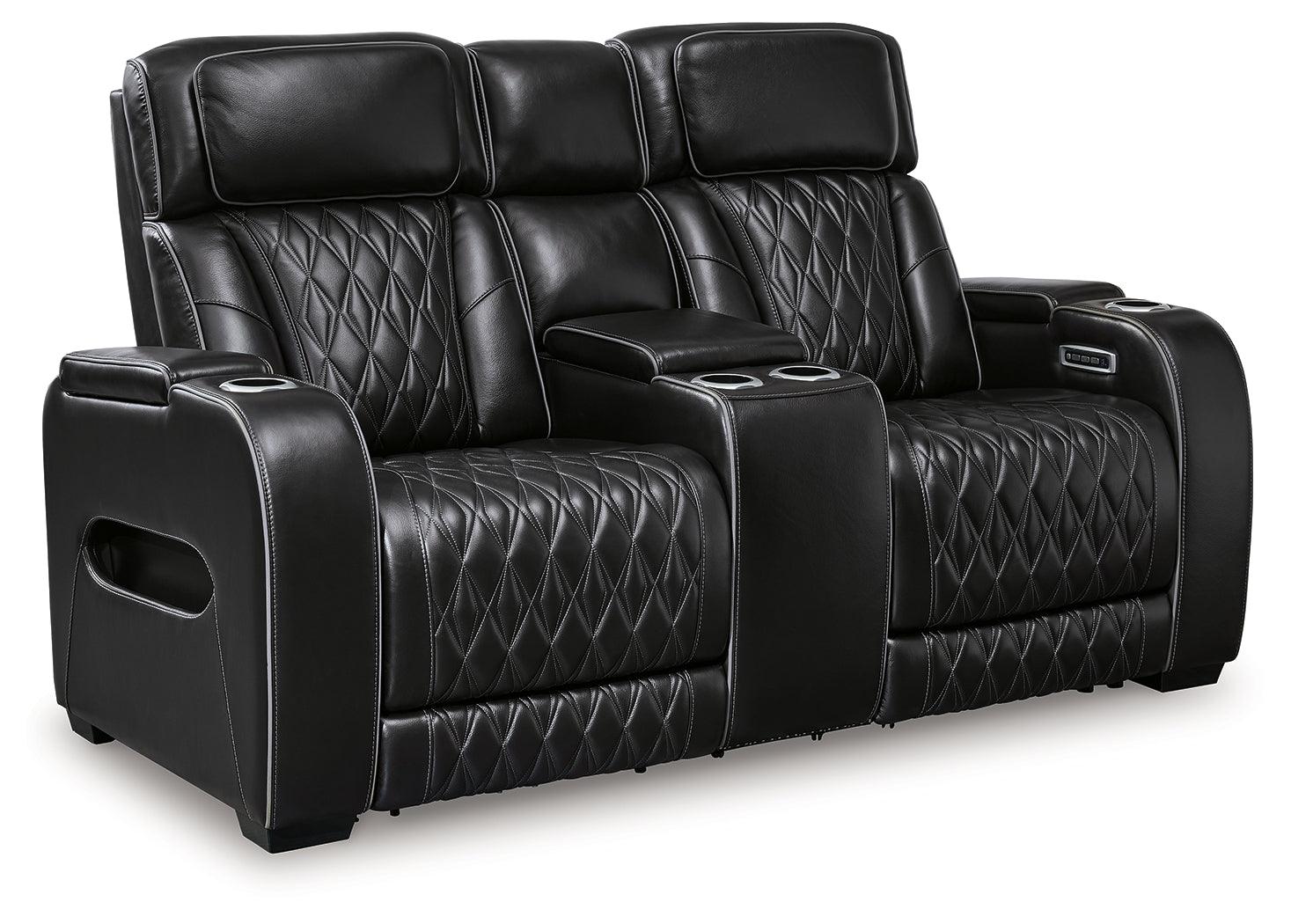 Close-up of diamond-stitched black leather upholstery