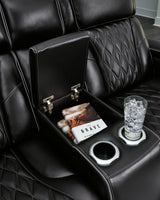 Extended ottoman of the Black Leather Loveseat