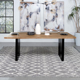 Black iron double pedestal legs under rectangular acacia wood dining table