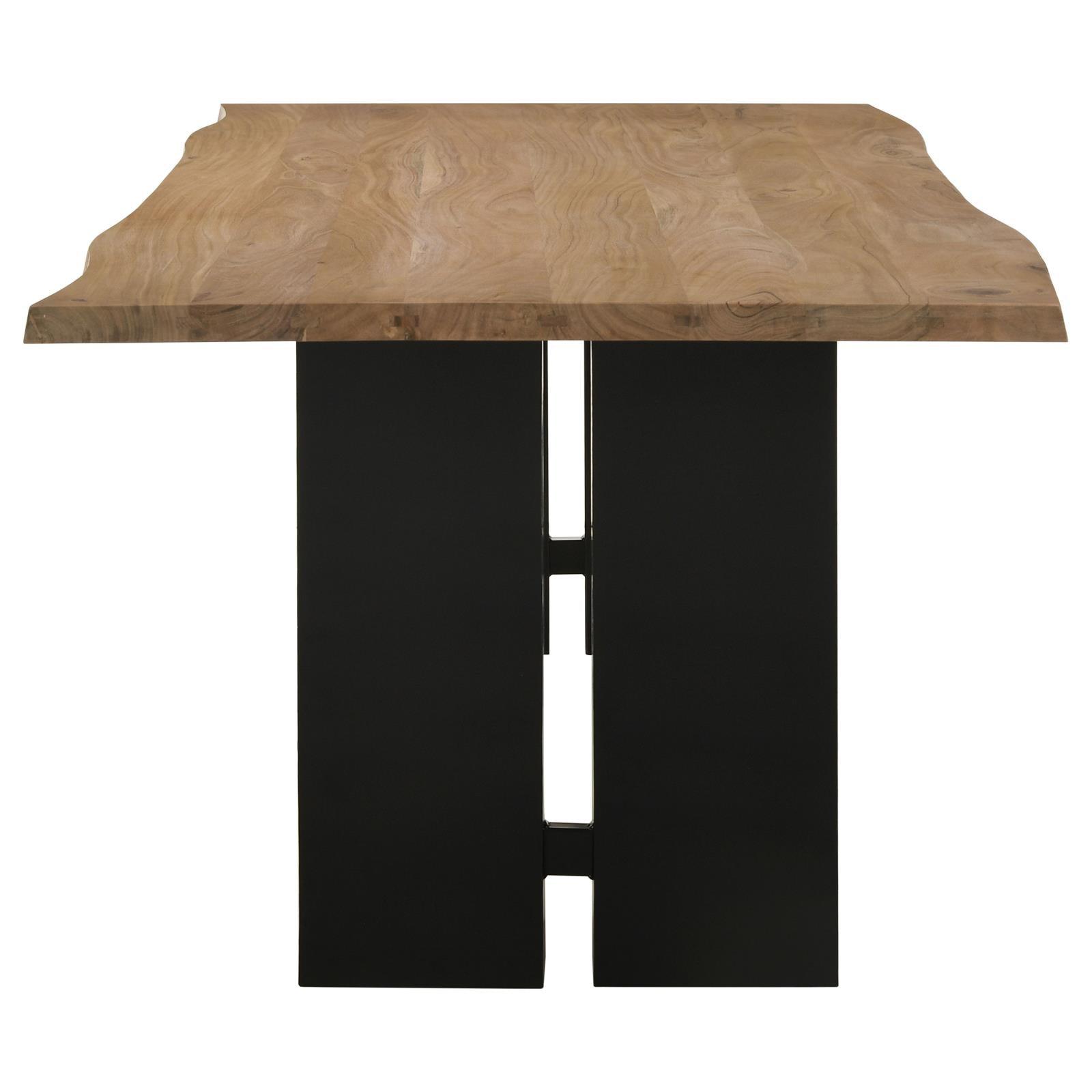 Dining table set in modern room showing Bradshaw's natural wood and black iron contrast