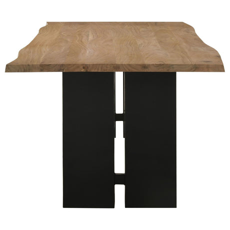 Dining table set in modern room showing Bradshaw's natural wood and black iron contrast