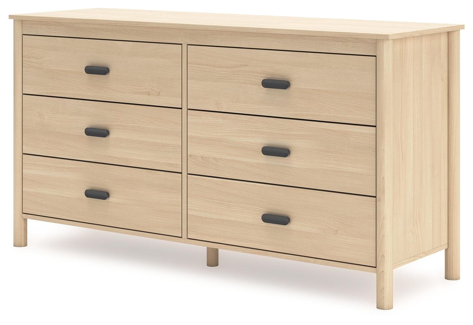 Close-up of six drawers with metallic brown knobs