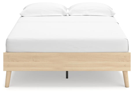 Bed frame footboard detail in tan ash laminate