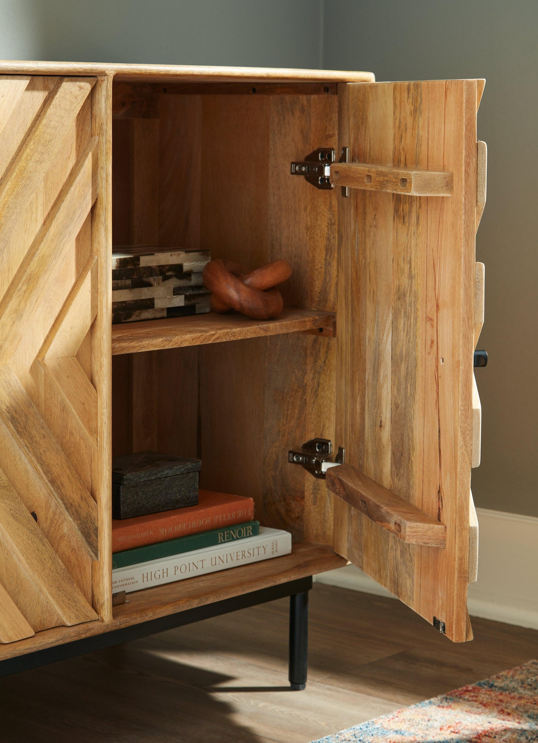 Cadewick Cabinet in living room setting with decor accents