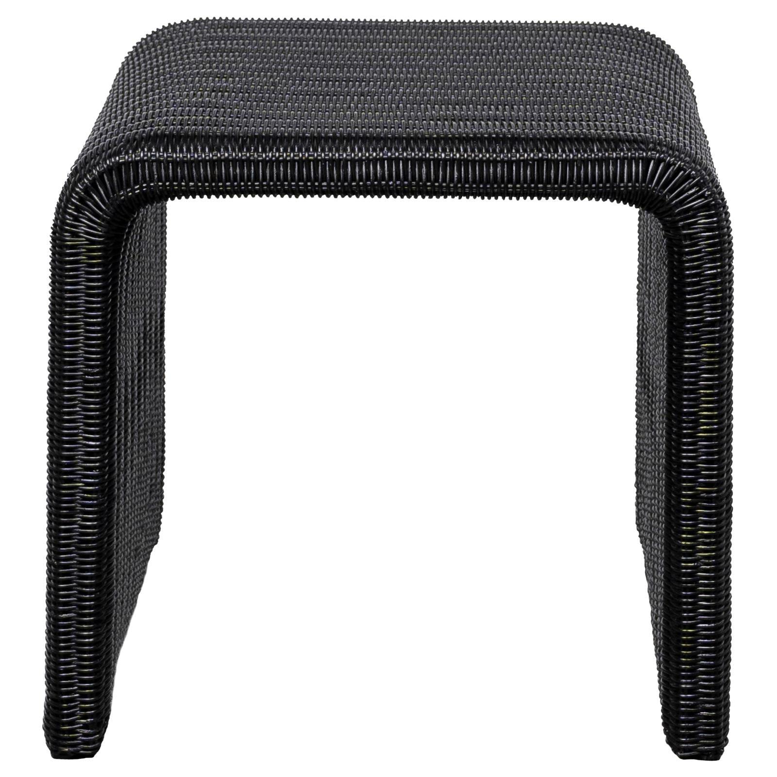 Close-up of woven rattan tabletop of Cahya end table