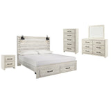 Side view of Cambeck Whitewash Panel Bedroom Set bed