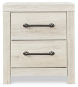 Bedroom scene with Cambeck Whitewash Panel Bedroom Set bed