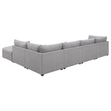 Room view showing Cambria 6-Piece Grey Upholstered Modular Sectional Sofa in living area
