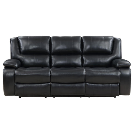 Manual recliner handle detail on Camila sofa