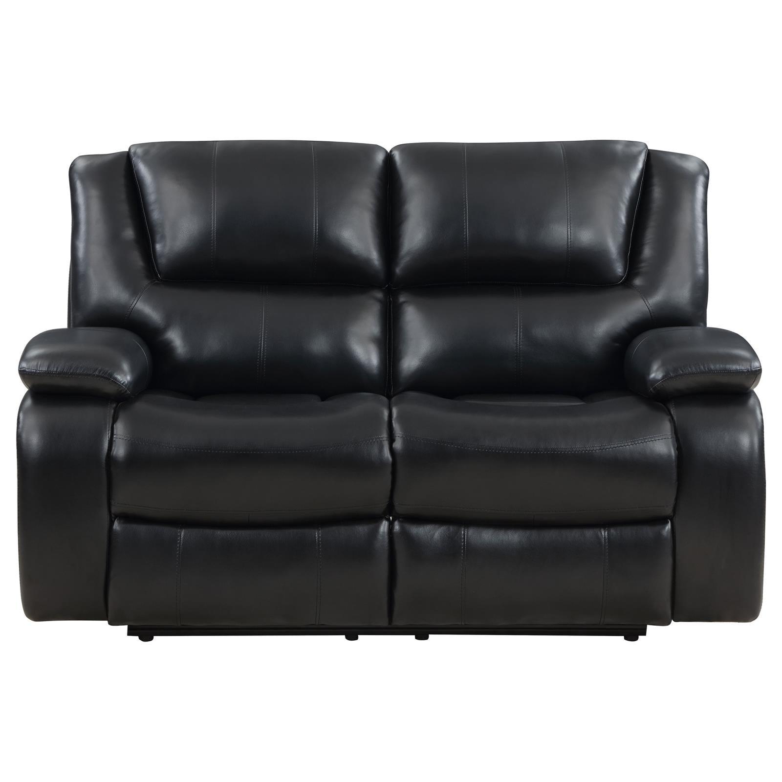 Close-up of black leatherette upholstery and padded armrest