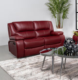 Camila loveseat showing manual recliner button on side