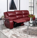Camila red upholstered motion reclining sofa showing manual recline button