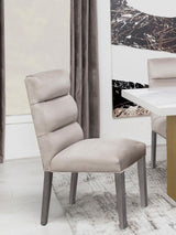 Carla Upholstered Dining Side Chair Stone, side view showing tapered legs