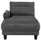 Side profile of grey upholstered sectional sofa