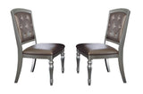 Room view of Orsina Pearl Dining Room Set with faux leather seating