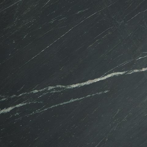Side angle of Ceilby round accent coffee table showing base detail