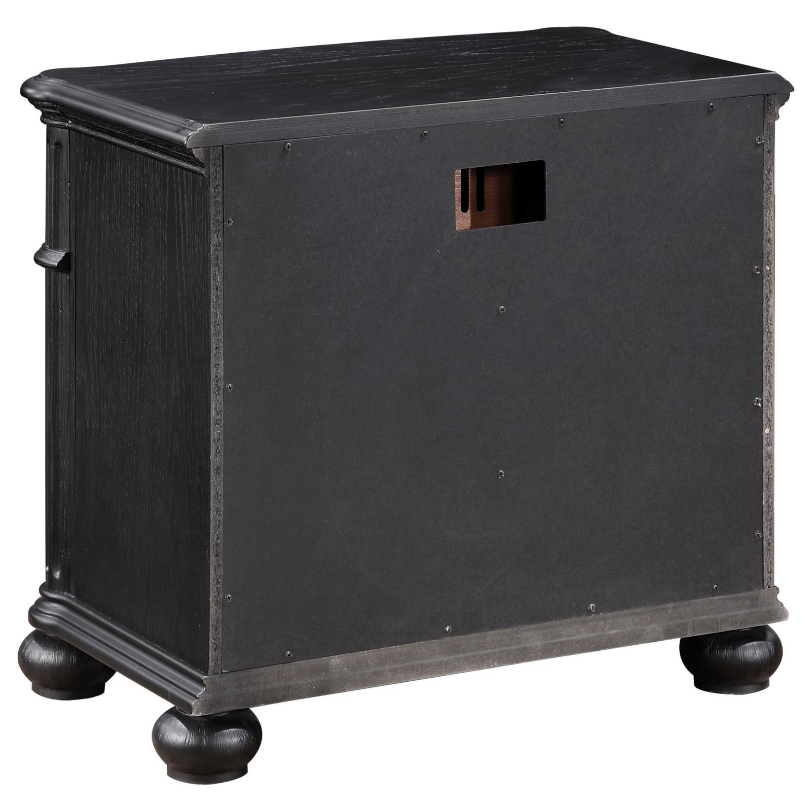 Detail of metal extension drawer glides on Celina nightstand