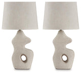 Pair of Chadrich antique beige table lamps on side tables