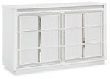 Close-up of Chalanna dresser drawer fronts with rhinestone frames and metal pulls