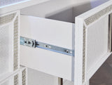 Fully closed Chalanna White Dresser in contemporary bedroom setting