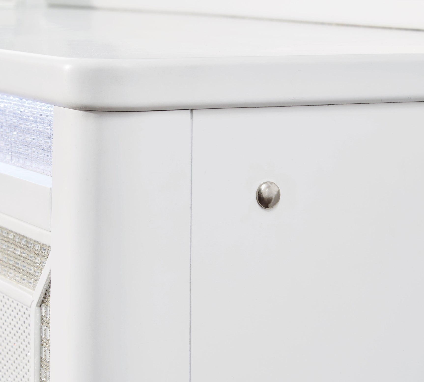 Chalanna White Dresser angled view highlighting textured laminate fronts