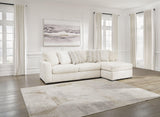 Room view of Chessington Ivory 2-Piece Sectional Sofa with Chaise in living space
