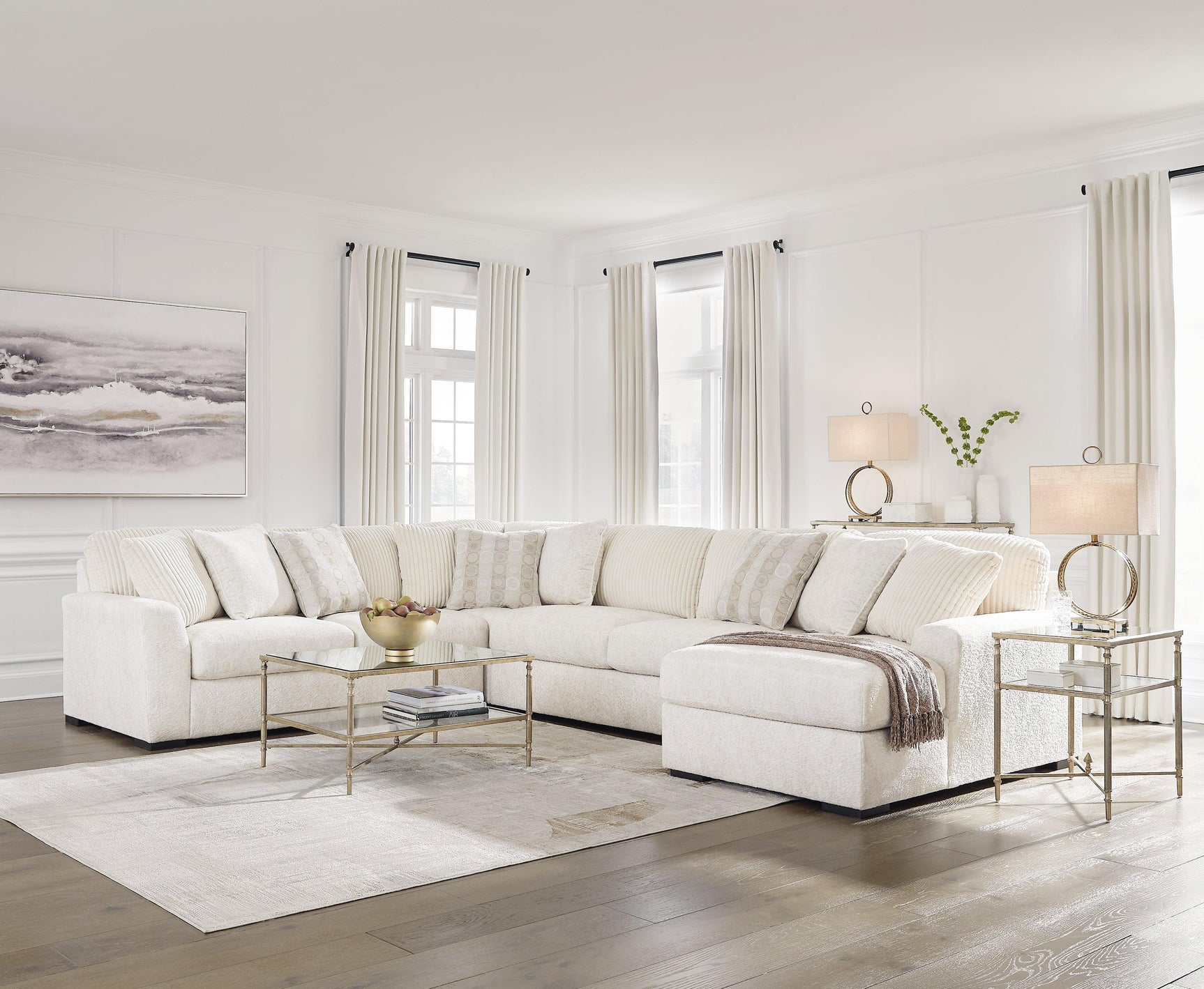Room view featuring Chessington Ivory 4-Piece Sectional Sofa with Chaise