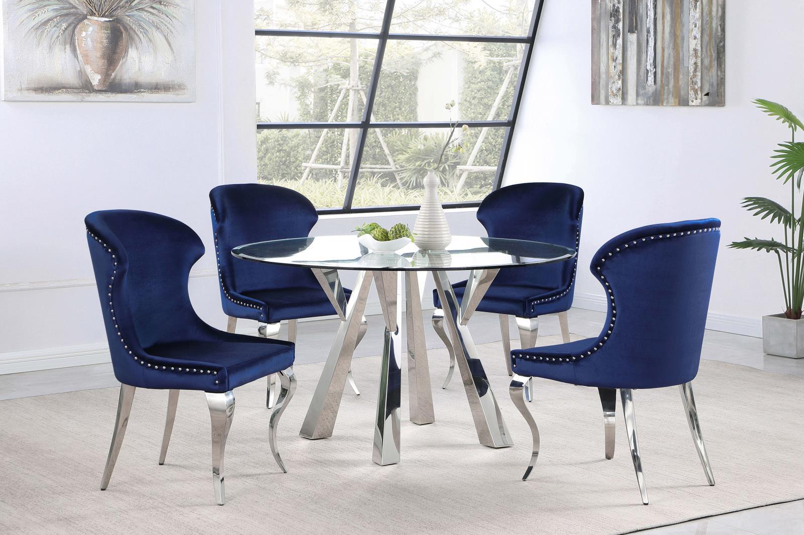 Pair of Cheyanne wingback chairs arranged at dining table