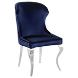 Close-up on soft velvet upholstery and hand-driven nailhead trim