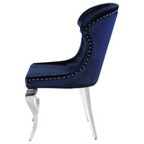 Pair of Cheyanne wingback upholstered dining chairs in ink blue