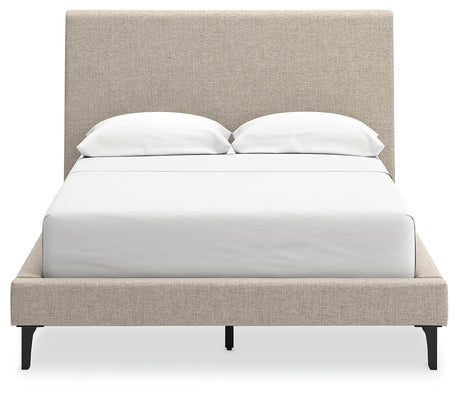 Footboard detail of Cielden Full Upholstered Bed in soft gray