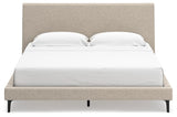 Low-profile footboard of Cielden King Upholstered Bed