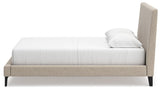 Cielden bed in bedroom setting with bedding