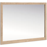 Cielden Tan Bedroom Mirror mounted on dresser