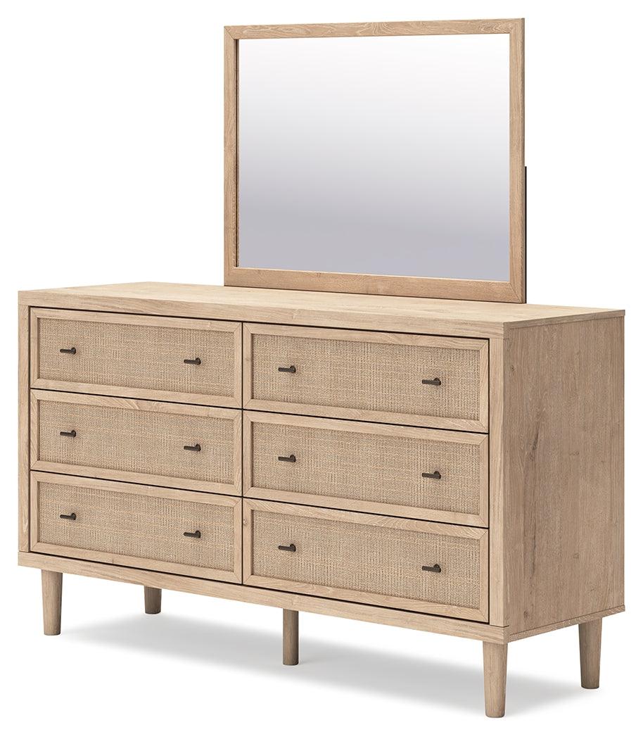 Detail of framed drawer fronts with replicated cane finish