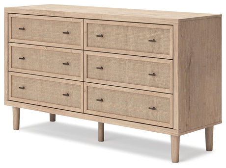 Textured beige cane-look drawer fronts of Cielden dresser