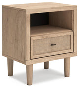 Side angle of Cielden Two-Tone Nightstand highlighting bronze-tone knob and framed drawer front