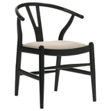 Close-up of beige fabric upholstered seat cushion and black hardwood frame