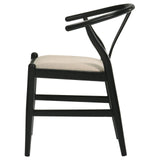 Detailed view of tapered wooden legs on dining side chair