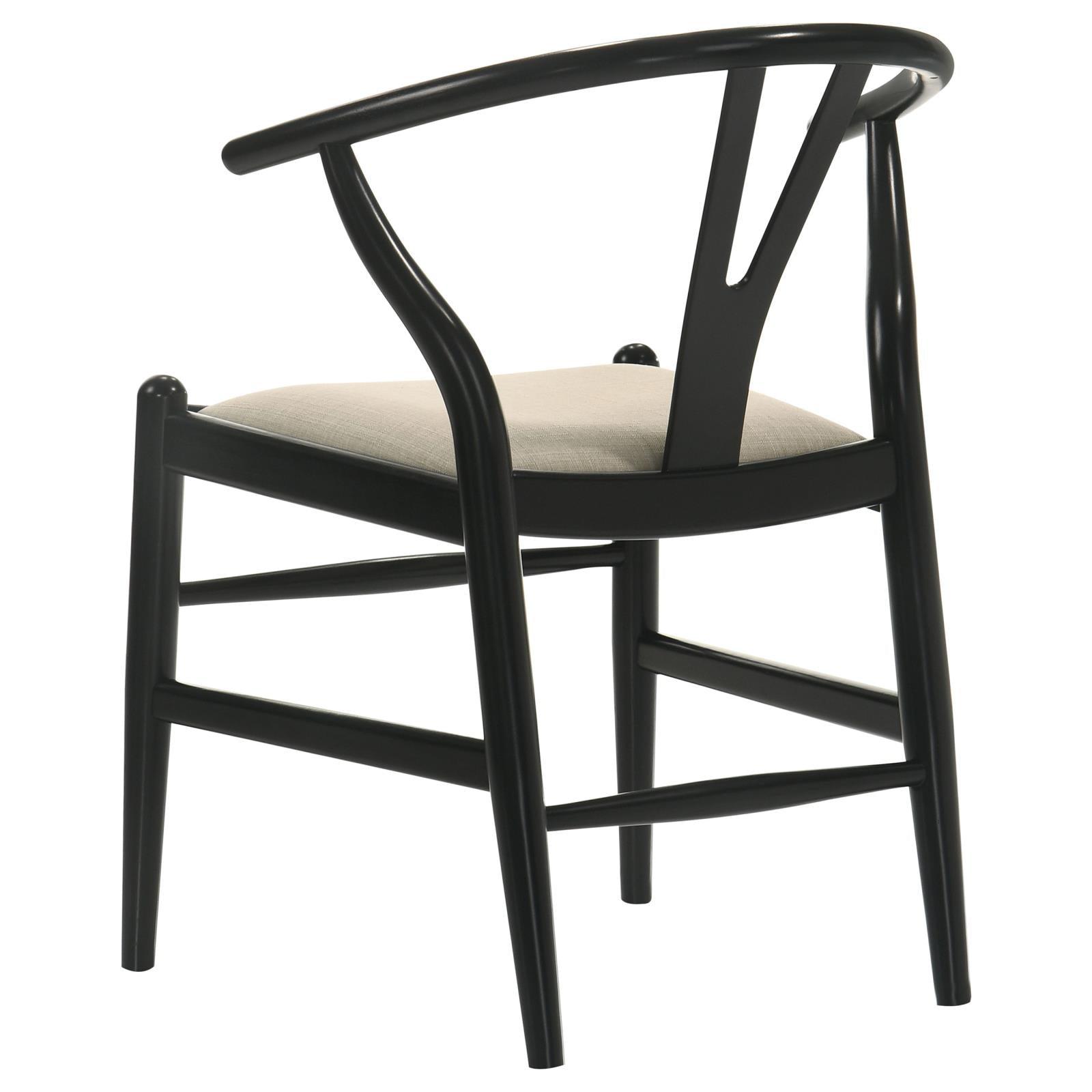 Pair of dining side chairs in kitchen setting with mixed materials table