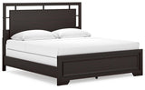Side angle of Covetown Dark Brown King Panel Bed