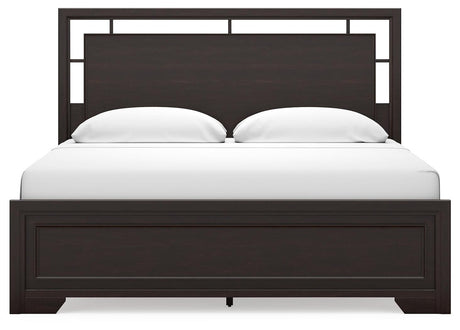 Dark brown finish on Covetown King Panel Bed