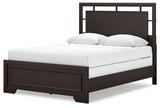 Side view of Covetown queen panel bed