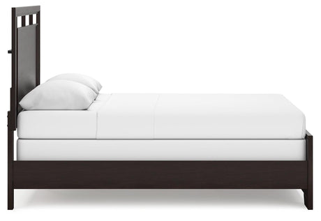 Full view of Covetown panel bed in dark brown finish