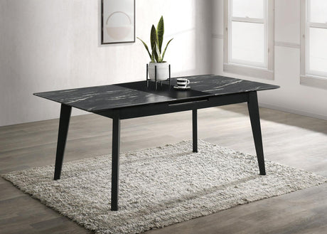 Crestmont dining table showing fin-style legs and recessed apron