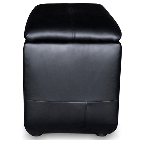 Black upholstered home theater storage wedge console with rounded top surface