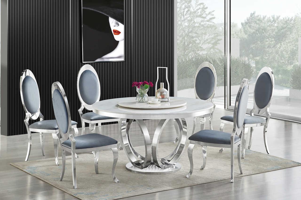 D615 Maxi white marble-like round dining table with chrome legs, angled view