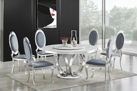 D615 Maxi white marble-like round dining table with chrome legs, angled view