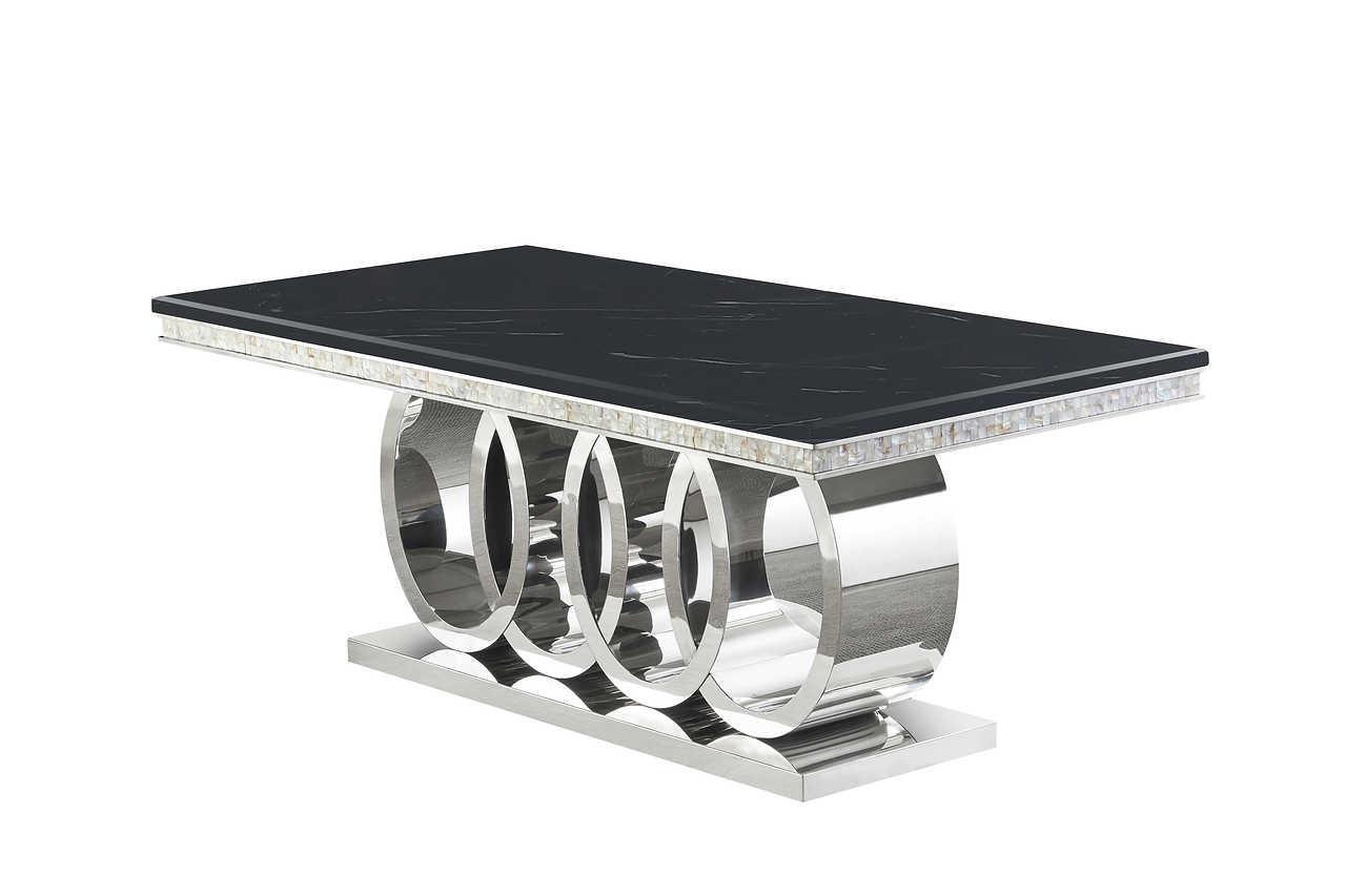 Close-up of black marble-like table top and chrome frame